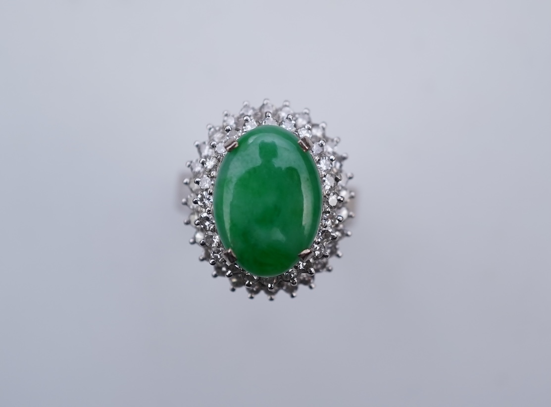 A jadeite and diamond ring